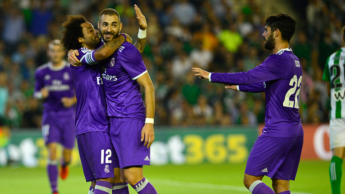 The players of the Real Madrid celebrate the third goal in front of the Real Betis