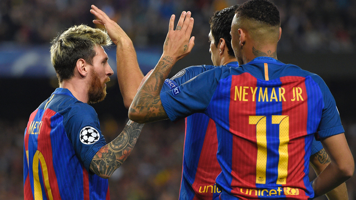 Leo Messi, Neymar Jr and Luis Suárez, celebrating a goal with the Barça