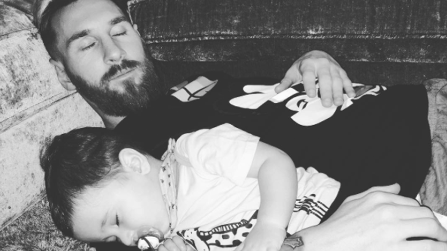 Leo Messi, resting beside his small son Mateo