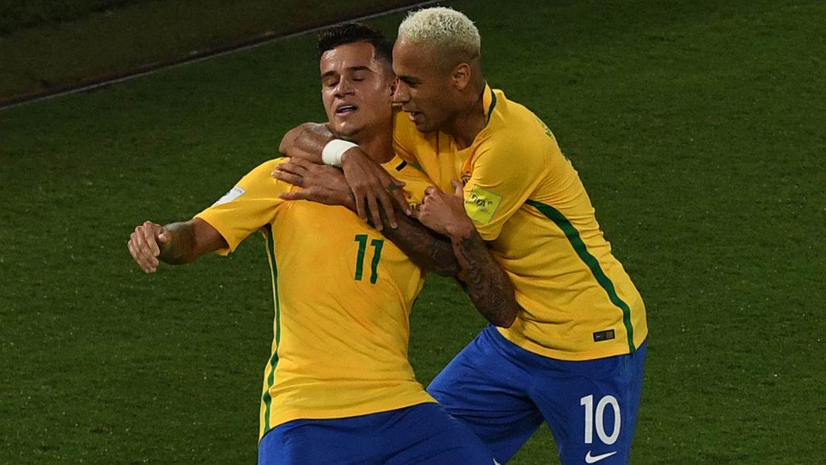 Neymar Jr, celebrating a goal beside Coutinho with Brazil