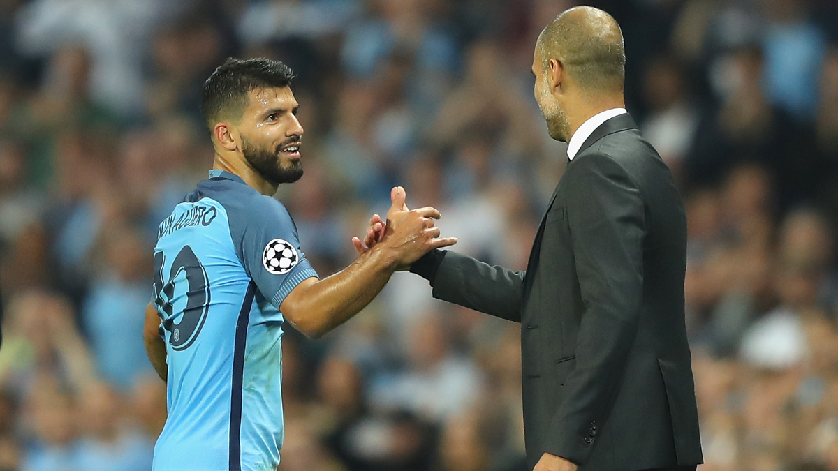 Sergio Agüero and Pep Guardiola, greeting during a party