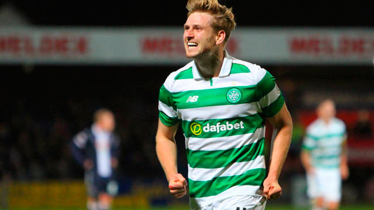 The forward of the Celtic Armstrong celebrates his goal to the Kilmarnock
