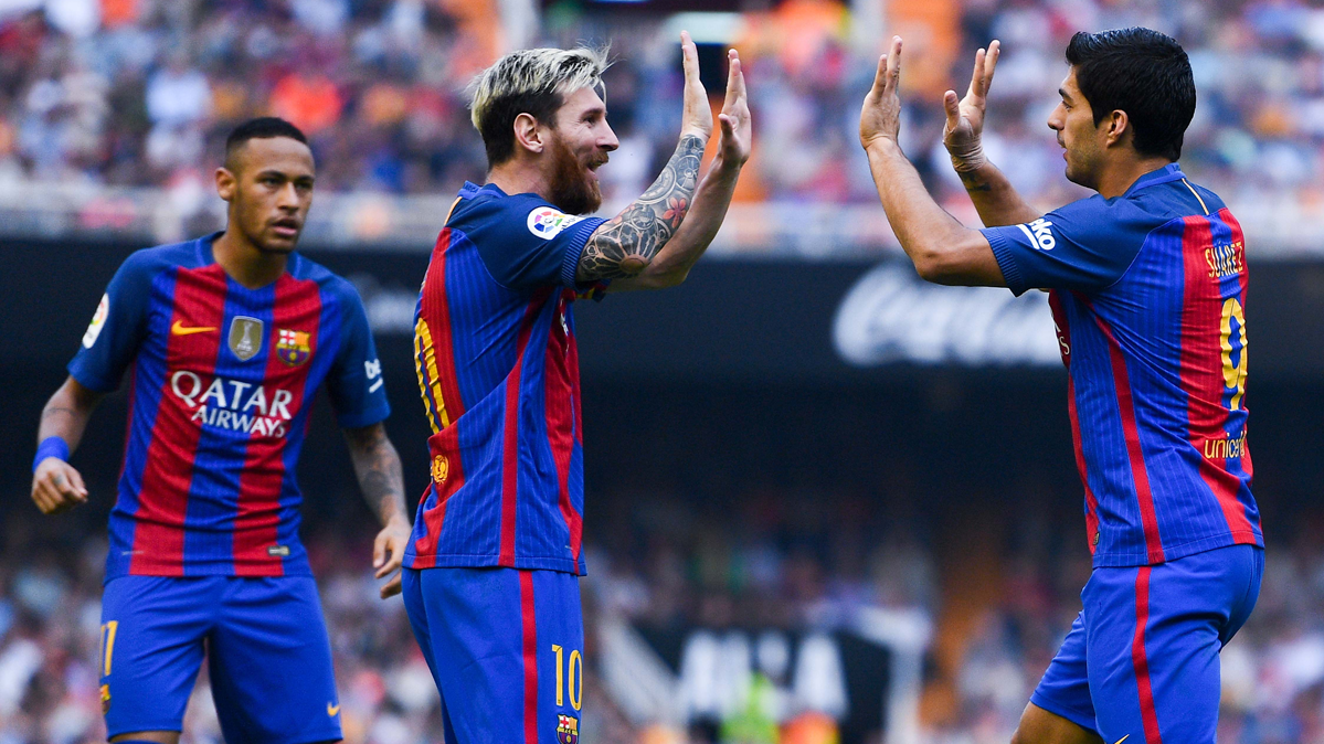 The trident of the Barça, celebrating a goal this season