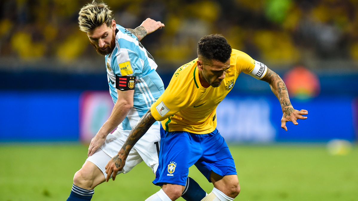 Dani Alves And Leo Messi, confronting in a Brazil-Argentina