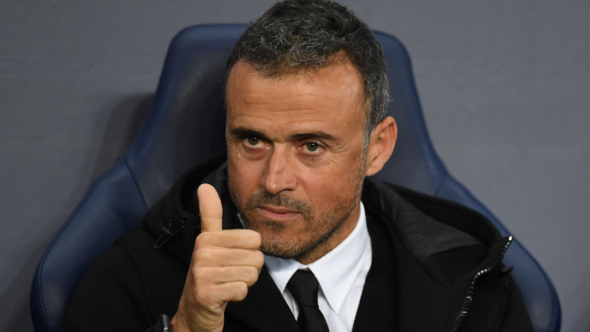 Luis Enrique, celebrating an action from the bench