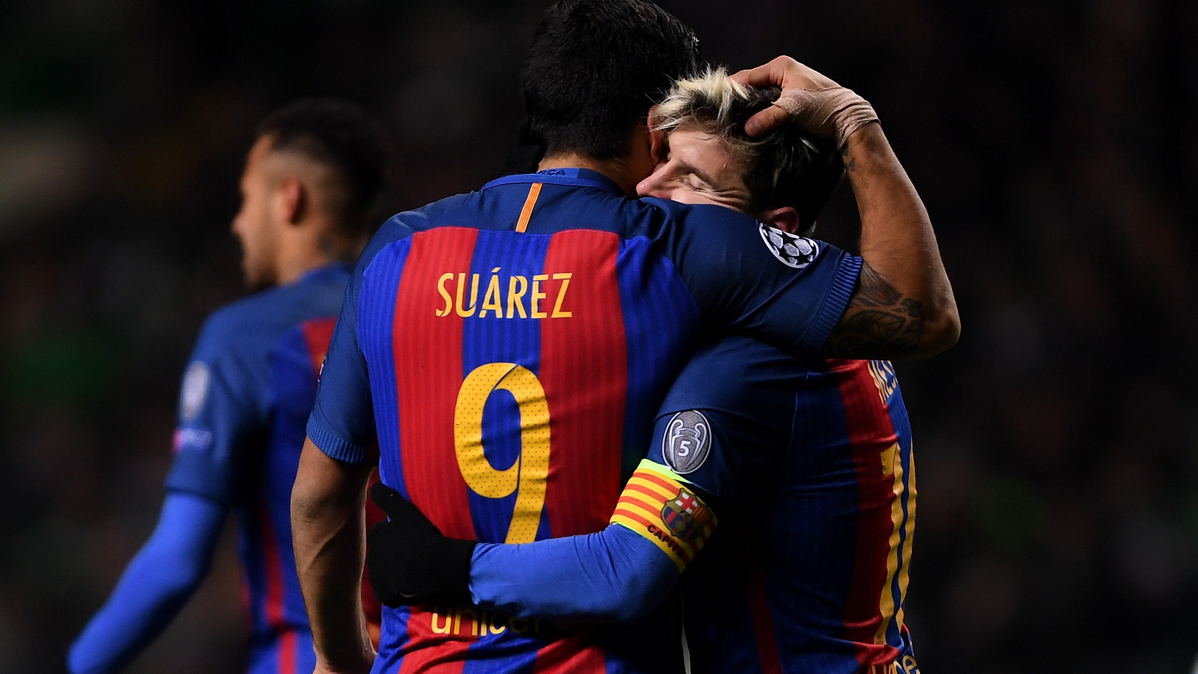 Leo Messi and Luis Suárez, celebrating a marked goal to the Celtic