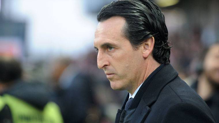 Unai Emery, with serious face during a party of the PSG