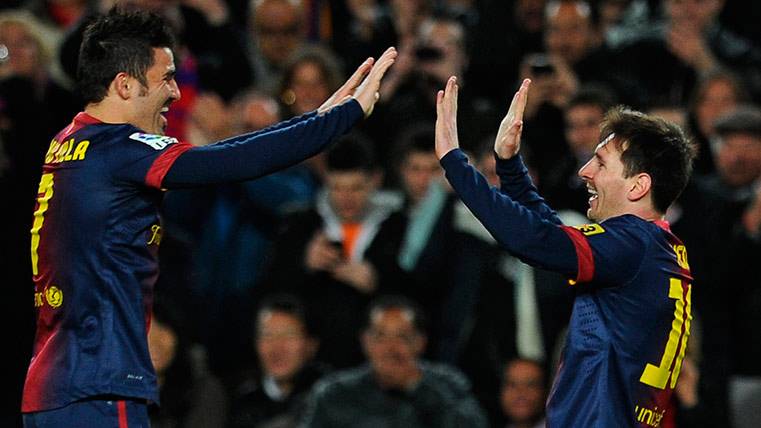 David Villa and Leo Messi celebrate a goal with the FC Barcelona