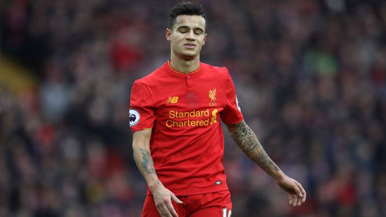 Philippe Coutinho, durante un partido con el Liverpool ante el Swansea