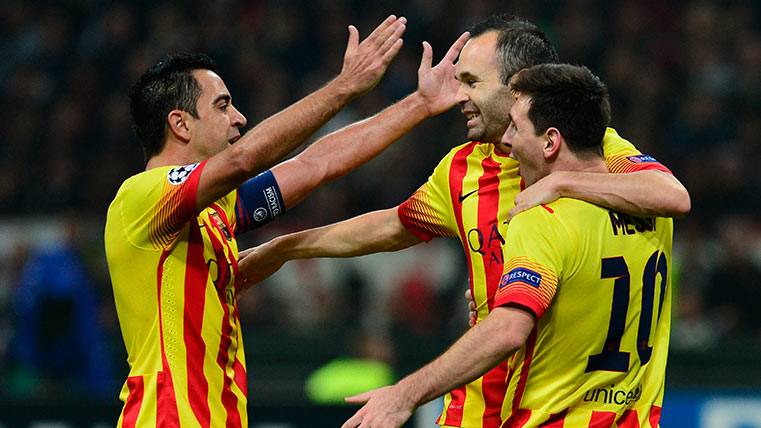 Xavi, Iniesta y Messi celebrando un gol con el Barça