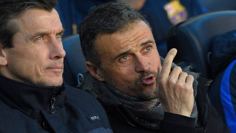Luis Enrique, speaking with Unzué during a party of the Barça