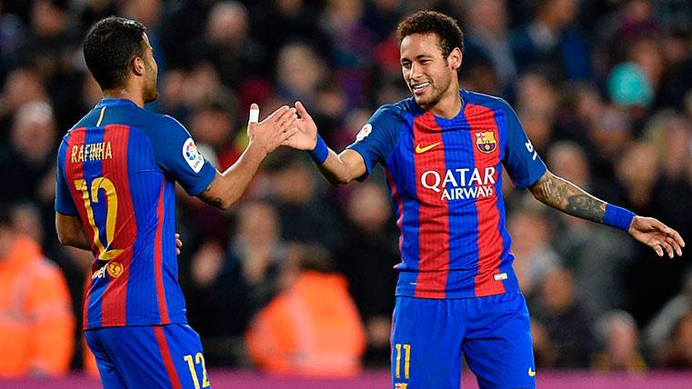 Rafinha And Neymar celebrate a goal with the Barça