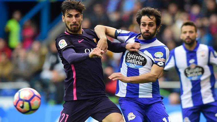 André Gomes, lidiando with a defender of the Sportive