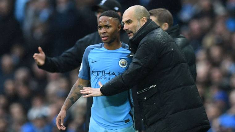 Pep Guardiola, speaking with Raheem Sterling during a party of the City