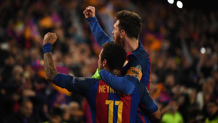 Neymar Jr And Leo Messi, celebrating a goal with the FC Barcelona