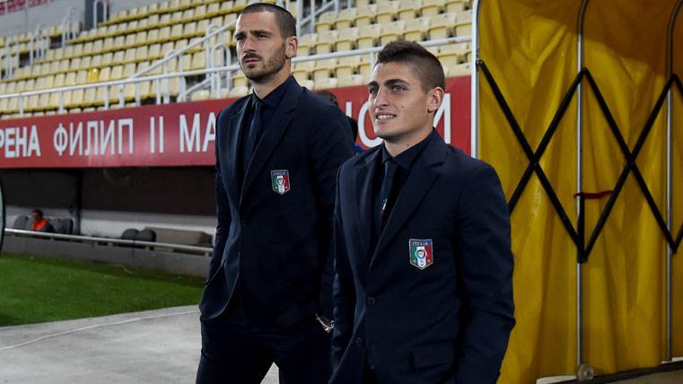 Marco Verratti, beside Bonucci in the concentration of Italy