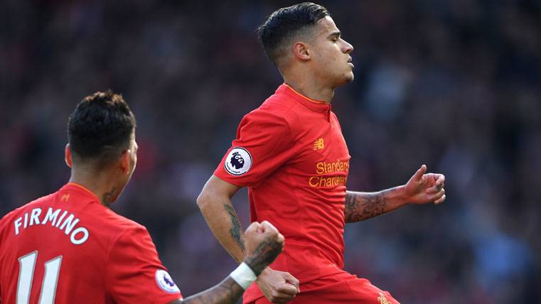 Philippe Coutinho, celebrating a marked goal with the Liverpool