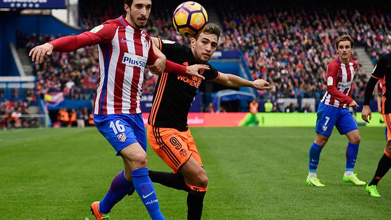 Munir The Haddadi in a party of the League Santander with Valencia