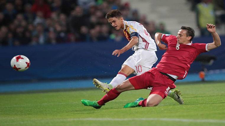 Denis marking a goal in front of Serbia