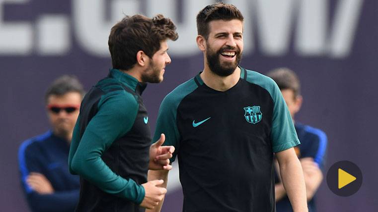 Gerard Hammered and Sergi Roberto in a training of the FC Barcelona