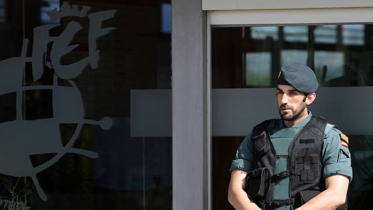 Policemen in the headquarters of the RFEF
