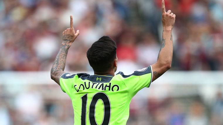 Philippe Coutinho, celebrating a goal with the Liverpool
