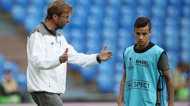 Philippe Coutinho and Jürgen Klopp, during a train with the Liverpool