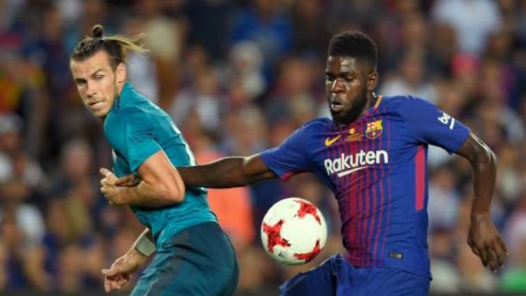 Umtiti In an action with Gareth Bleat