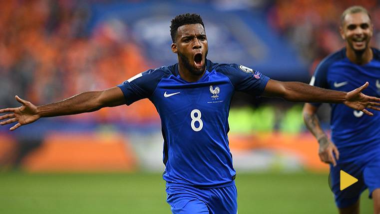 Thomas Lemar celebrates a goal with the selection of France