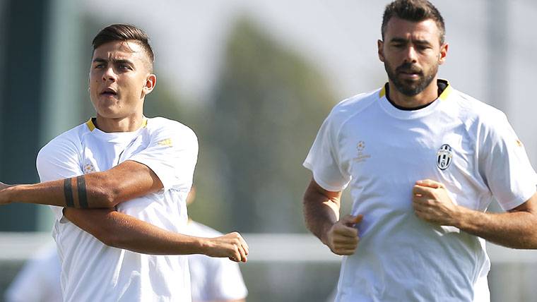 Andrea Barzagli and Paulo Dybala, during a train with the Juventus
