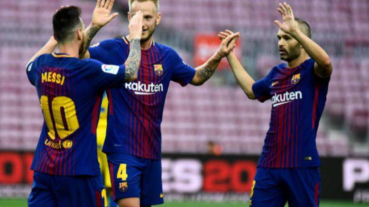 Iniesta celebrating a goal of Messi