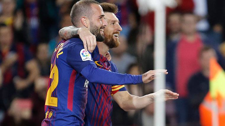 Aleix Vidal, celebrating a goal beside Leo Messi