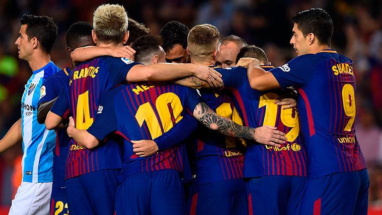 Los jugadores del Barça celebran uno de los goles contra el Málaga