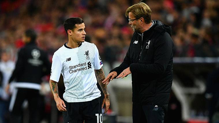 Philippe Coutinho and Jürgen Klopp in a party of the Liverpool
