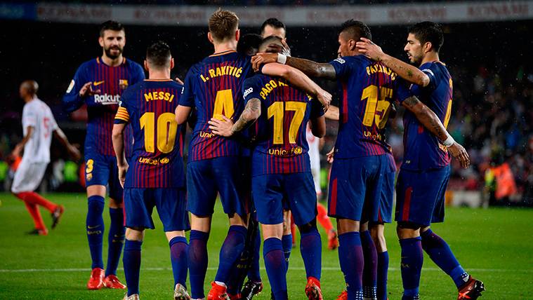 The players of the FC Barcelona celebrate one of the goals against the Seville