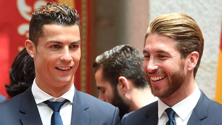 Sergio Bouquets and Cristiano Ronaldo, during an event