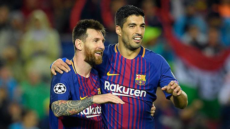 Messi y Luis Suárez durante un partido