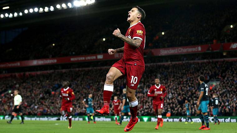 Philippe Coutinho, celebrating a marked goal with the Liverpool