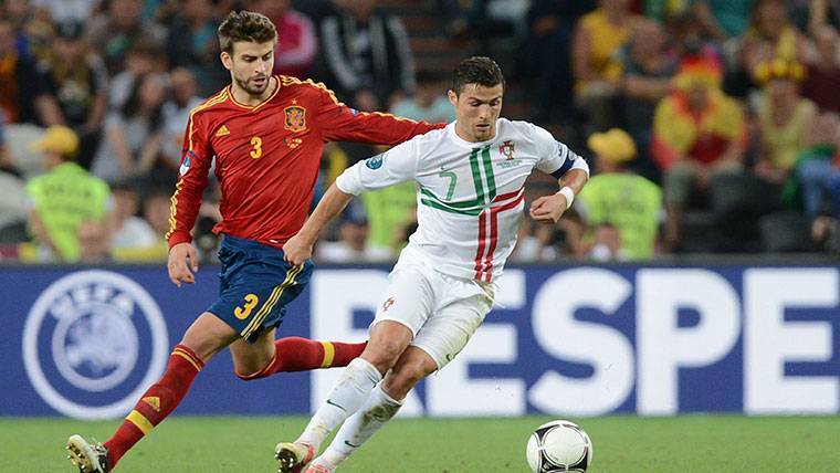 Gerard Piqué y Cristiano Ronaldo en un España-Portugal