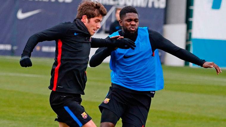 Sergi Roberto and Samuel Umtiti in a training of the FC Barcelona