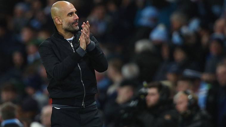 Pep Guardiola celebrates a victory of the Manchester City