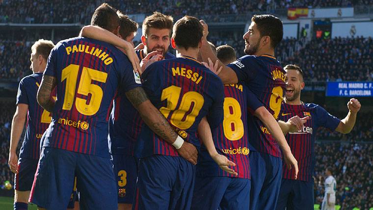 The FC Barcelona, celebrating a goal against the Real Madrid in League