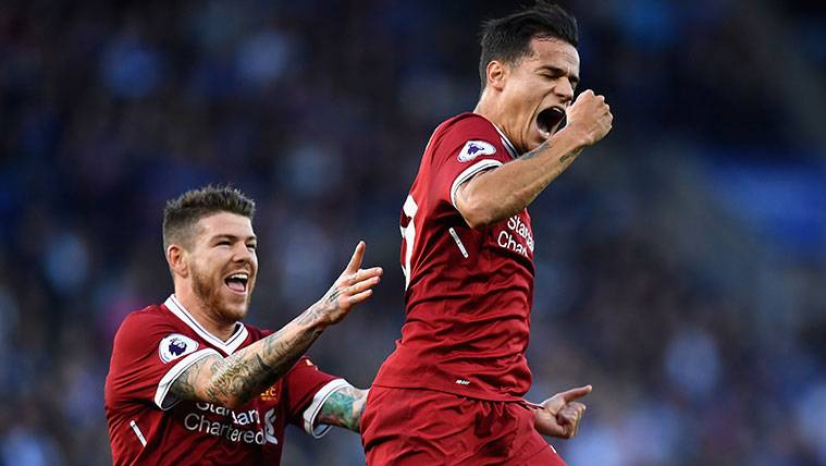 Philippe Coutinho celebrates a goal with the Liverpool