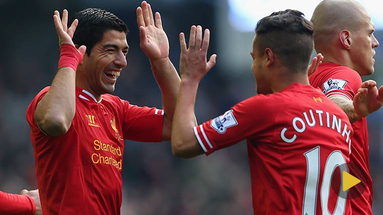 Luis Suárez and Philippe Coutinho celebrate a goal with the Liverpool