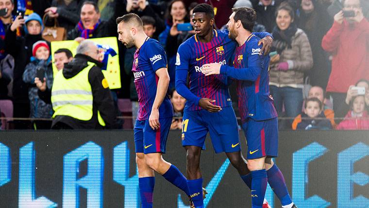 Dembélé, celebrating a goal of the FC Barcelona beside Messi and Alba
