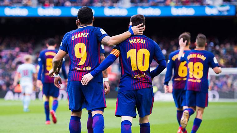Luis Suárez and Leo Messi, celebrating a goal