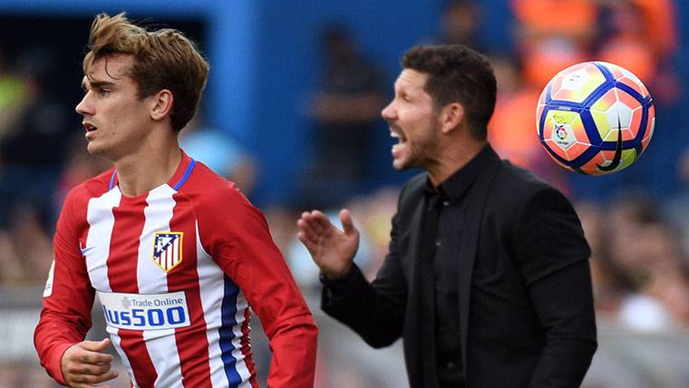 Diego Pablo Simeone, giving instructions while Griezmann plays