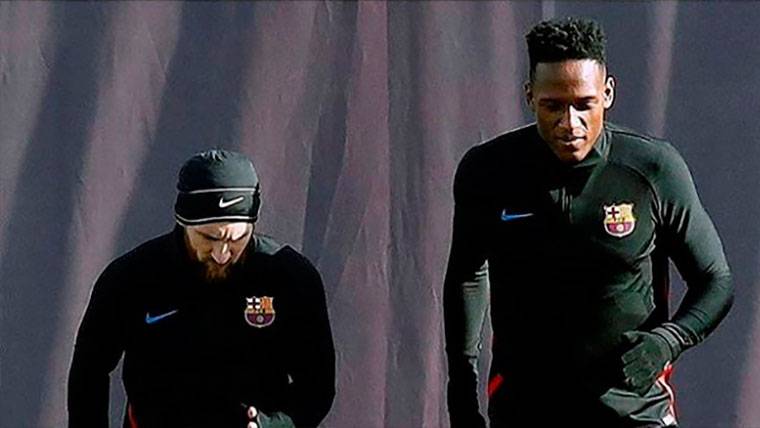 Leo Messi y Yerry Mina, durante un entrenamiento