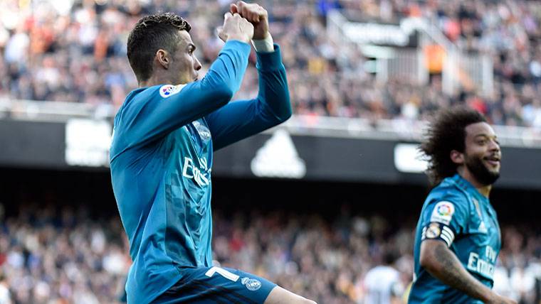 Cristiano Ronaldo, celebrating a marked goal with the Real Madrid