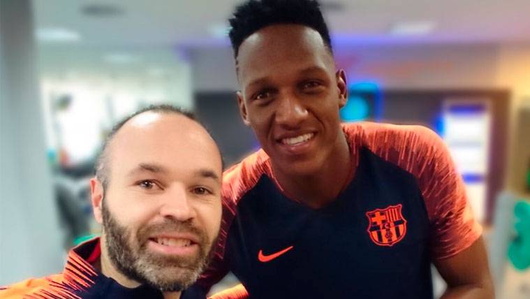 Andrés Iniesta and Yerry Mina after a party of the FC Barcelona
